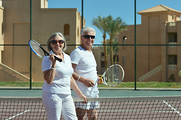 Image showing senior couple on tennis court