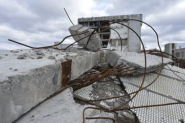 Image showing Pieces of Metal and Stone are Crumbling from Demolished Building Floors