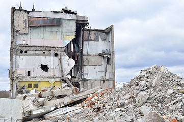 Image showing Pieces of Metal and Stone are Crumbling from Demolished Building Floors