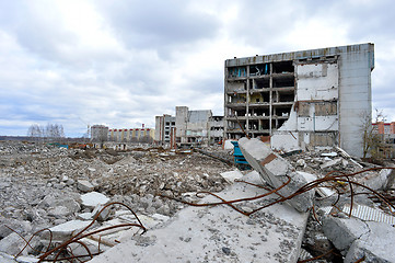 Image showing Pieces of Metal and Stone are Crumbling from Demolished Building Floors