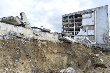 Image showing Pieces of Metal and Stone are Crumbling from Demolished Building Floors