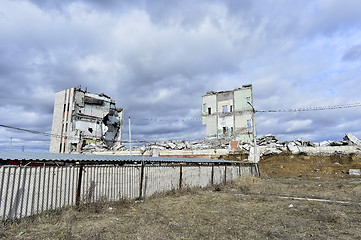 Image showing Pieces of Metal and Stone are Crumbling from Demolished Building Floors