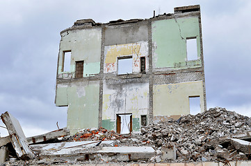 Image showing Pieces of Metal and Stone are Crumbling from Demolished Building Floors