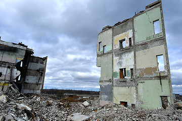 Image showing Pieces of Metal and Stone are Crumbling from Demolished Building Floors