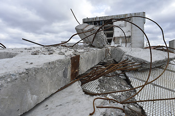 Image showing Pieces of Metal and Stone are Crumbling from Demolished Building Floors