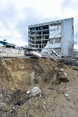 Image showing Pieces of Metal and Stone are Crumbling from Demolished Building Floors