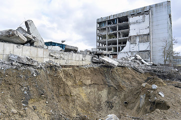 Image showing Pieces of Metal and Stone are Crumbling from Demolished Building Floors