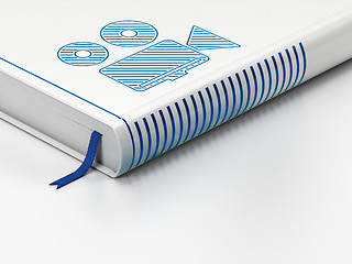 Image showing Vacation concept: closed book, Camera on white background