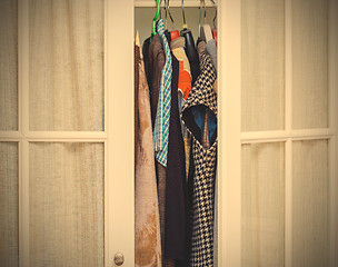 Image showing clothes in a white wardrobe