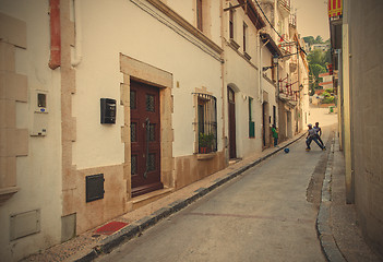 Image showing Tossa de Mar, Spain, June 17, 2013: Children play with a ball