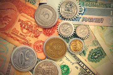 Image showing Coins gearweels on the money background