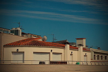 Image showing white stone house with red tiled