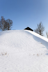 Image showing snow covered hill  