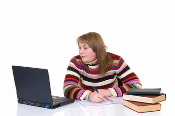 Image showing Girl student doing schoolwork