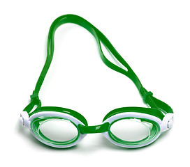 Image showing Green goggles for swimming on white