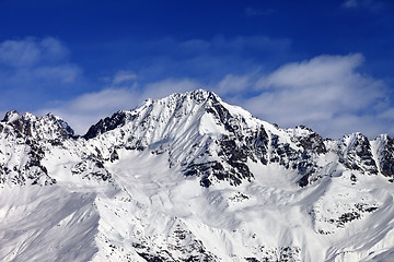 Image showing Snowy mountains at sun day