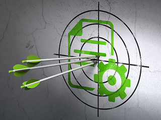 Image showing Software concept: arrows in Gear target on wall background