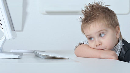 Image showing cute Little boy with computer