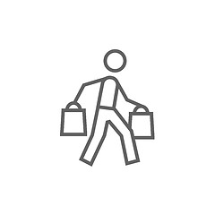 Image showing Man carrying shopping bags line icon.