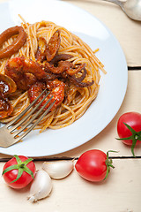 Image showing Italian seafood spaghetti pasta on red tomato sauce 