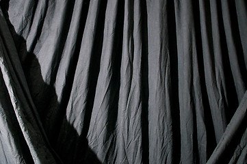 Image showing Draped black background cloth