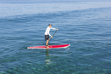 Image showing Senior man practicing paddle