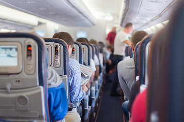 Image showing Passengers on commercial airplane.