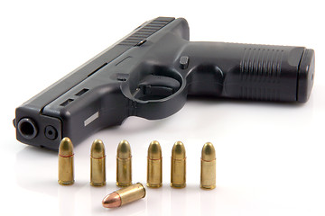 Image showing row bullets and gun