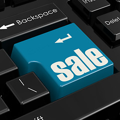 Image showing Computer keyboard with word sale button