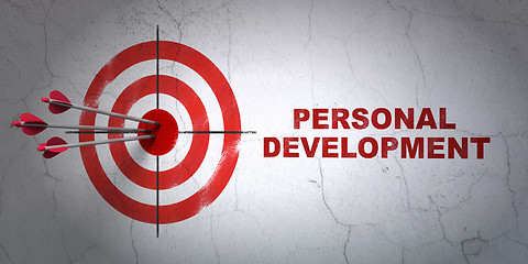 Image showing Learning concept: target and Personal Development on wall background