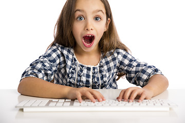 Image showing Little girl working with a computer