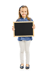 Image showing Girl holding a chalkboard