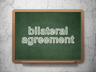 Image showing Insurance concept: Bilateral Agreement on chalkboard background