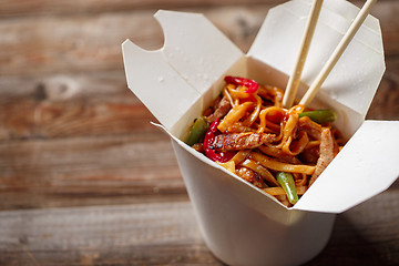 Image showing Asian noodles with fresh green onion and boiled egg