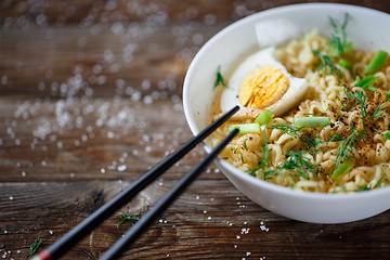 Image showing Asian noodles with fresh green onion and boiled egg