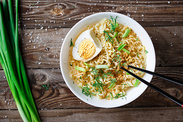 Image showing Asian noodles with fresh green onion and boiled egg