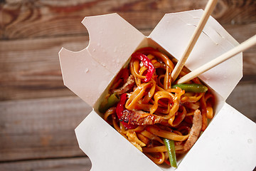 Image showing Asian noodles with fresh green onion and boiled egg