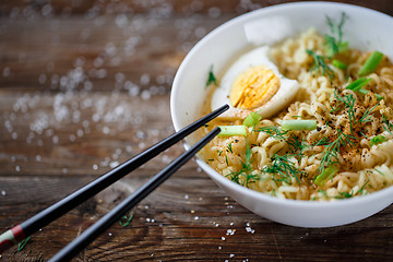 Image showing Asian noodles with fresh green onion and boiled egg