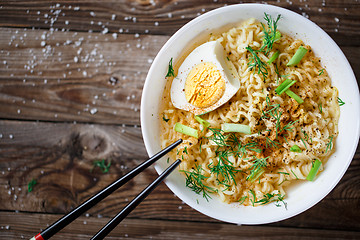 Image showing Asian noodles with fresh green onion and boiled egg