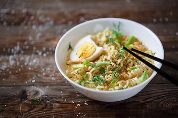 Image showing Asian noodles with fresh green onion and boiled egg