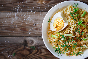 Image showing Asian noodles with fresh green onion and boiled egg