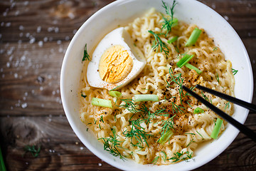 Image showing Asian noodles with fresh green onion and boiled egg