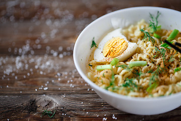 Image showing Asian noodles with fresh green onion and boiled egg
