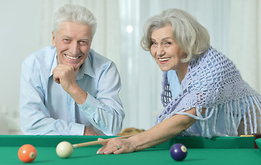 Image showing old couple playing billiard