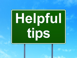 Image showing Learning concept: Helpful Tips on road sign background
