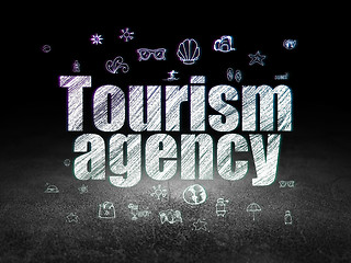 Image showing Vacation concept: Tourism Agency in grunge dark room