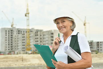 Image showing senior  woman  in under construction