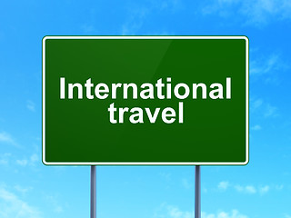 Image showing Tourism concept: International Travel on road sign background