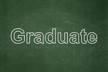 Image showing Education concept: Graduate on chalkboard background