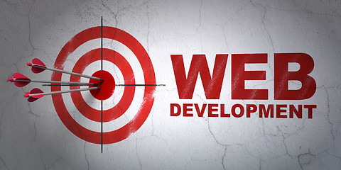 Image showing Web development concept: target and Web Development on wall background